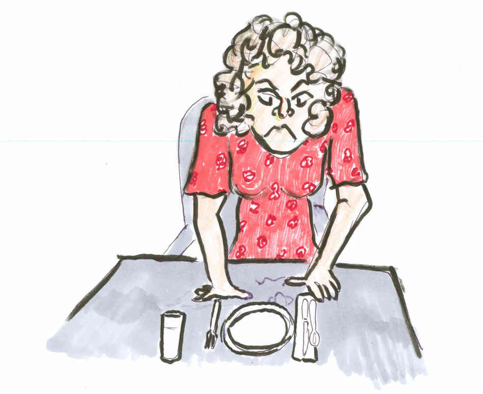 Angry mom at dinner table. Angry mom at dinner table.