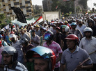Egyptian President Mohammed Morsi says he will not resign, despite a military demand that he reach a compromise with critics. Here, Morsi supporters take part in a drill during a demonstration in the suburb of Nasr City Tuesday. Egyptian President Mohammed Morsi says he will not resign, despite a military demand that he reach a compromise with critics. Here, Morsi supporters take part in a drill during a demonstration in the suburb of Nasr City Tuesday.