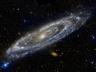 "The Galaxy Next Door" — This composite image of the Andromeda galaxy was produced by NASA's Galaxy Evolution Explorer, showing Andromeda's ultraviolet side. NASA sent a decommission command to the space telescope Friday. "The Galaxy Next Door" — This composite image of the Andromeda galaxy was produced by NASA's Galaxy Evolution Explorer, showing Andromeda's ultraviolet side. NASA sent a decommission command to the space telescope Friday.