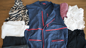 The "wearable luggage" vest, surrounded by the contents Geewax packed in it for her hypothetical weekend trip.