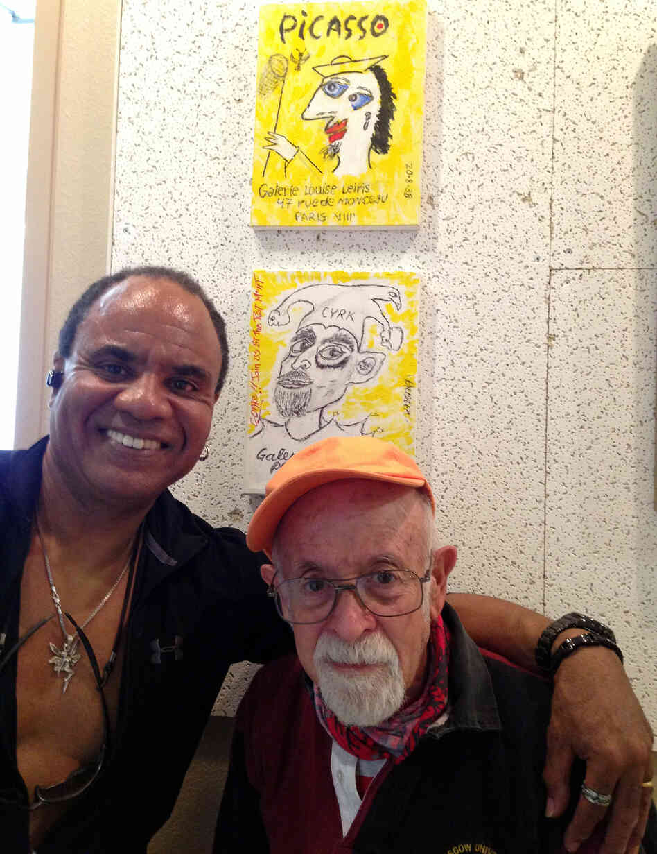 Buster Sussman, 86, shown with his art instructor, Randall Williams, is a former real estate reporter who only recently started painting. His paintings were on display at the Burbank Senior Artists Colony. Buster Sussman, 86, shown with his art instructor, Randall Williams, is a former real estate reporter who only recently started painting. His paintings were on display at the Burbank Senior Artists Colony.