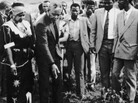 In 1990, Nelson Mandela (wearing a dark suit, pointing down) visited the graves of family members in Qunu, South Africa. A grandson's 2011 decision to move some relatives' remains to another site was followed by a lawsuit and court action. In 1990, Nelson Mandela (wearing a dark suit, pointing down) visited the graves of family members in Qunu, South Africa. A grandson's 2011 decision to move some relatives' remains to another site was followed by a lawsuit and court action.