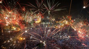 Fireworks light the sky opponents of Egypt's Islamist President Mohammed Morsi celebrate in Tahrir Square.