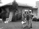 Three civil rights workers stand guard in front NAACP attorney Arthur Shores' house in Sept. 1963. The house was blasted by dynamite the night before. Three civil rights workers stand guard in front NAACP attorney Arthur Shores' house in Sept. 1963. The house was blasted by dynamite the night before.