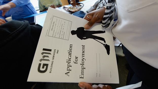 At a job fair in Los Angeles last month, job seekers filled out applications. (Getty Images)
