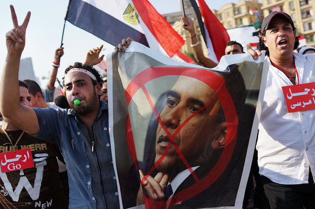 Egyptian protesters celebrate in Tahrir Square on Wednesday. The United States has managed to alienate just about every political actor in Egypt. (Image credit: Getty Images)