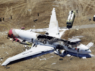 The wreckage of Asiana Flight 214, a Boeing 777 airliner, is seen after it crashed at the San Francisco International Airport Saturday. The crash-landing killed two teenage Chinese girls, the airline says. The wreckage of Asiana Flight 214, a Boeing 777 airliner, is seen after it crashed at the San Francisco International Airport Saturday. The crash-landing killed two teenage Chinese girls, the airline says.