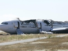 National Transportation Safety Board officials handed out this photo of the burnt shell of Asiana Flight 214 during their first assessment of the crash. Two people died Saturday and scores more were injured. National Transportation Safety Board officials handed out this photo of the burnt shell of Asiana Flight 214 during their first assessment of the crash. Two people died Saturday and scores more were injured.