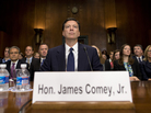 FBI Director nominee James Comey prepares to testify on Capitol Hill in Washington on Tuesday, before the Senate Judiciary Committee hearing on his nomination. Comey spent 15 years as a federal prosecutor before serving in the George W. Bush administration, where he is best-known for facing down the White House over a warrantless surveillance program. FBI Director nominee James Comey prepares to testify on Capitol Hill in Washington on Tuesday, before the Senate Judiciary Committee hearing on his nomination. Comey spent 15 years as a federal prosecutor before serving in the George W. Bush administration, where he is best-known for facing down the White House over a warrantless surveillance program.
