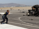 The pilot who attempted to land Asiana Airlines Flight 214 in San Francisco , says the National Transportation Safety Board. Here, a member of the team investigating the crash-landing takes a photo of the plane's landing gear. The pilot who attempted to land Asiana Airlines Flight 214 in San Francisco , says the National Transportation Safety Board. Here, a member of the team investigating the crash-landing takes a photo of the plane's landing gear.