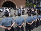 MIT police officers stand at attention outside a federal courthouse where Boston Marathon bombing suspect Dzhokhar Tsarnaev pleaded not guilty to 30 counts today. He is also accused in the death of MIT officer Sean Collier. MIT police officers stand at attention outside a federal courthouse where Boston Marathon bombing suspect Dzhokhar Tsarnaev pleaded not guilty to 30 counts today. He is also accused in the death of MIT officer Sean Collier.