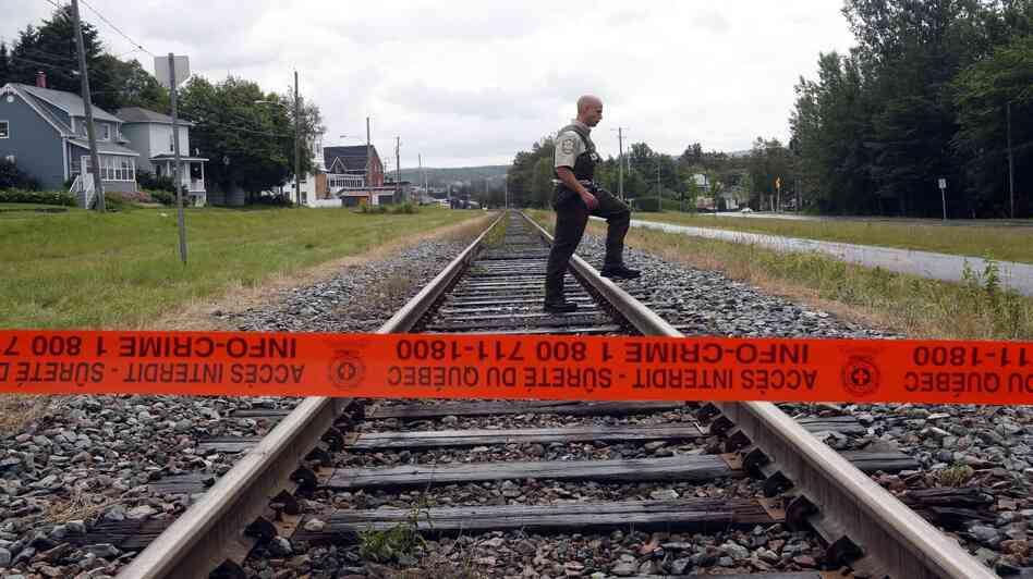 Do not cross: Crime scene tape blocks access to part of Lac-Mégantic, Quebec, where a train derailed and exploded on Saturday. Do not cross: Crime scene tape blocks access to part of Lac-Mégantic, Quebec, where a train derailed and exploded on Saturday.