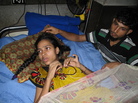 Rebecca Khatun, a worker at Rana Plaza, lies in a hospital bed. She lost her left leg and right foot in the collapse, which also killed five members of her family. Khatun received $120 and free medical care for her loss -- compensation she says won't be enough for what she's been through. Rebecca Khatun, a worker at Rana Plaza, lies in a hospital bed. She lost her left leg and right foot in the collapse, which also killed five members of her family. Khatun received $120 and free medical care for her loss -- compensation she says won't be enough for what she's been through.