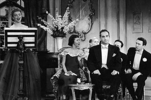 Caesar, flanked by cast performers Imogene Coca and Carl Reiner, listens to a singer in a skit from the TV comedy series Your Show of Shows, in 1952. (Image credit: Getty Images)