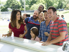 Improbably or not, Salma Hayek (left) and Adam Sandler (far right) are a couple again in Grown Ups 2. Billed as a comedy, the film also features Kevin James, Alexys Nicole Sanchez, Chris Rock, Maria Bello and David Spade, who in this scene are all pretending to laugh at something that in all likelihood involves poo. Improbably or not, Salma Hayek (left) and Adam Sandler (far right) are a couple again in Grown Ups 2. Billed as a comedy, the film also features Kevin James, Alexys Nicole Sanchez, Chris Rock, Maria Bello and David Spade, who in this scene are all pretending to laugh at something that in all likelihood involves poo.