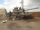 Free Syrian Army fighters after a battle against government troops in Zaizoon, near Dera'a, on Feb. 16. Free Syrian Army fighters after a battle against government troops in Zaizoon, near Dera'a, on Feb. 16.