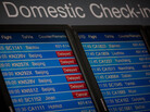 A domestic departures board shows flight delays at Beijing's international airport in January. A domestic departures board shows flight delays at Beijing's international airport in January.