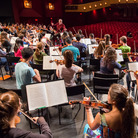 Conductor Valery Gergiev leads the National Youth Orchestra through its first rehearsal with the maestro, at Purchase College outside New York City. Conductor Valery Gergiev leads the National Youth Orchestra through its first rehearsal with the maestro, at Purchase College outside New York City.