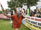 Chimurenqa Waller leads demonstrators in a chant in front of the Seminole County Courthouse while the jury deliberated in the trial of George Zimmerman on Friday Chimurenqa Waller leads demonstrators in a chant in front of the Seminole County Courthouse while the jury deliberated in the trial of George Zimmerman on Friday