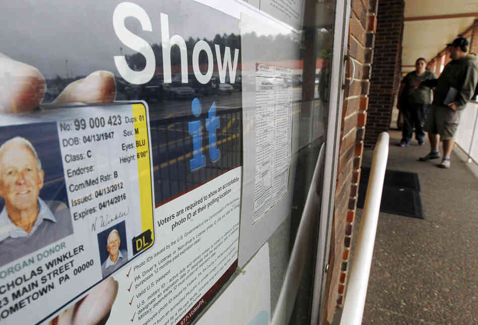 The Penndot Drivers License Center in Butler, Pa., displays signs ...