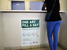 A woman waits to get AIDS drugs on April 8 at a clinic in Ga-Rankuwa, South Africa, about 55 miles north of Johannesburg. New WHO guidelines say patients should start HIV treatment much earlier, before they become extremely sick. A woman waits to get AIDS drugs on April 8 at a clinic in Ga-Rankuwa, South Africa, about 55 miles north of Johannesburg. New WHO guidelines say patients should start HIV treatment much earlier, before they become extremely sick.