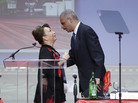 Attorney General Eric Holder greets Alexis Margaret Herman, member of the Delta Sigma Theta sorority, before speaking at the organization's convention. Attorney General Eric Holder greets Alexis Margaret Herman, member of the Delta Sigma Theta sorority, before speaking at the organization's convention.