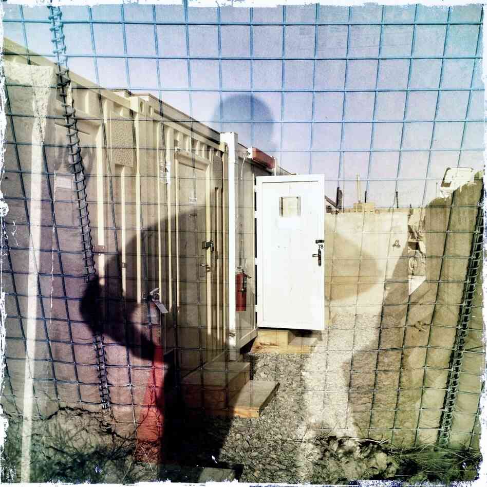 A double exposure and self-portrait at a combat outpost in southern Afghanistan. A double exposure and self-portrait at a combat outpost in southern Afghanistan.