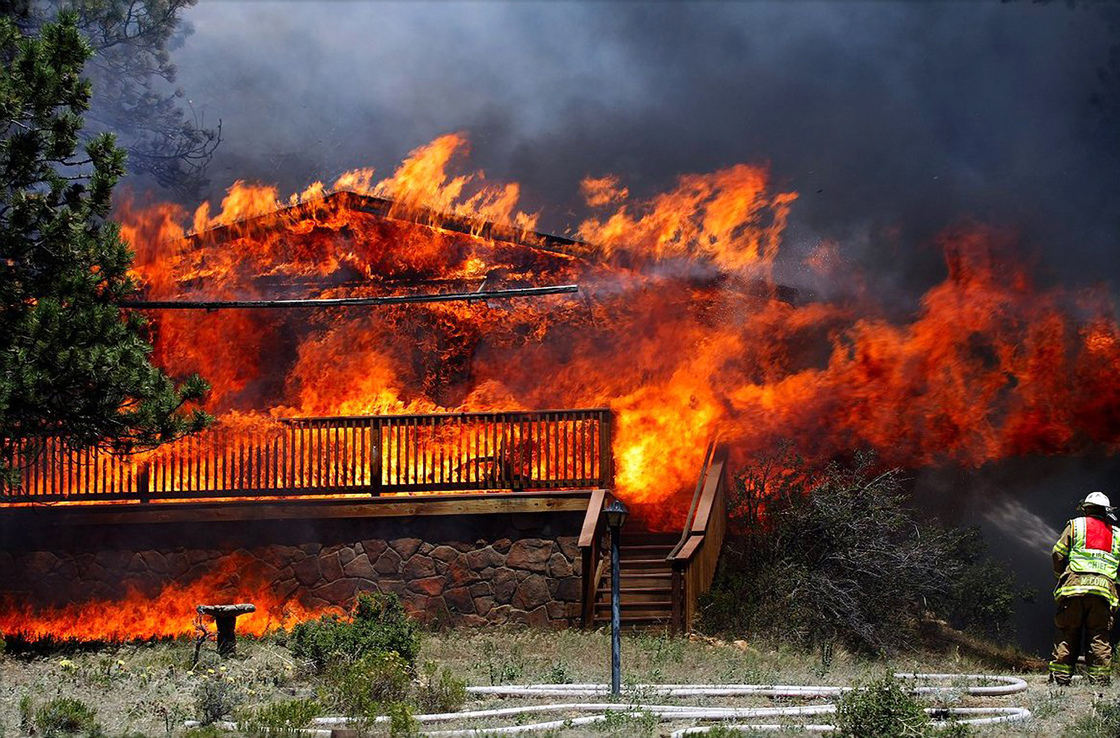 Fire consumed a home in Estes Park, Colo., on June 23, 2012. This fire claimed as many as 21 structures.