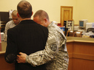 U.S. Army Captain Michael Potoczniak (right) embraced his partner of 10 years Todd Saunders as they obtained their marriage license at City Hall in San Francisco on June 29. U.S. Army Captain Michael Potoczniak (right) embraced his partner of 10 years Todd Saunders as they obtained their marriage license at City Hall in San Francisco on June 29.
