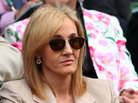 Looking a little mysterious: J.K. Rowling in the stands at the Wimbledon Lawn Tennis Championships last month. Looking a little mysterious: J.K. Rowling in the stands at the Wimbledon Lawn Tennis Championships last month.