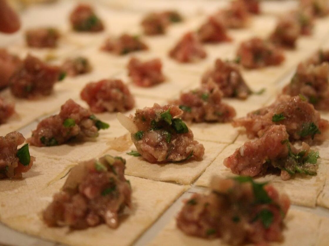 In Turkey, bits of meat are wrapped in squares of pasta to make manti.