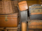 Old suitcases displayed in the Ellis Island Immigration Museum in New York City. Old suitcases displayed in the Ellis Island Immigration Museum in New York City.