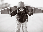 A boy prepares with his jetpack. A boy prepares with his jetpack.