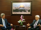 Secretary of State John Kerry meets with Palestinian President Mahmoud Abbas in Ramallah, West Bank, on Friday. Shortly afterward, Kerry announced a "basis" for the Israelis and Palestinians to resume peace negotiations. Secretary of State John Kerry meets with Palestinian President Mahmoud Abbas in Ramallah, West Bank, on Friday. Shortly afterward, Kerry announced a "basis" for the Israelis and Palestinians to resume peace negotiations.
