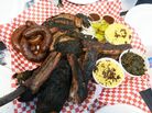 The Pecan Lodge's combination plate, a meat lover's dream. The Pecan Lodge's combination plate, a meat lover's dream.