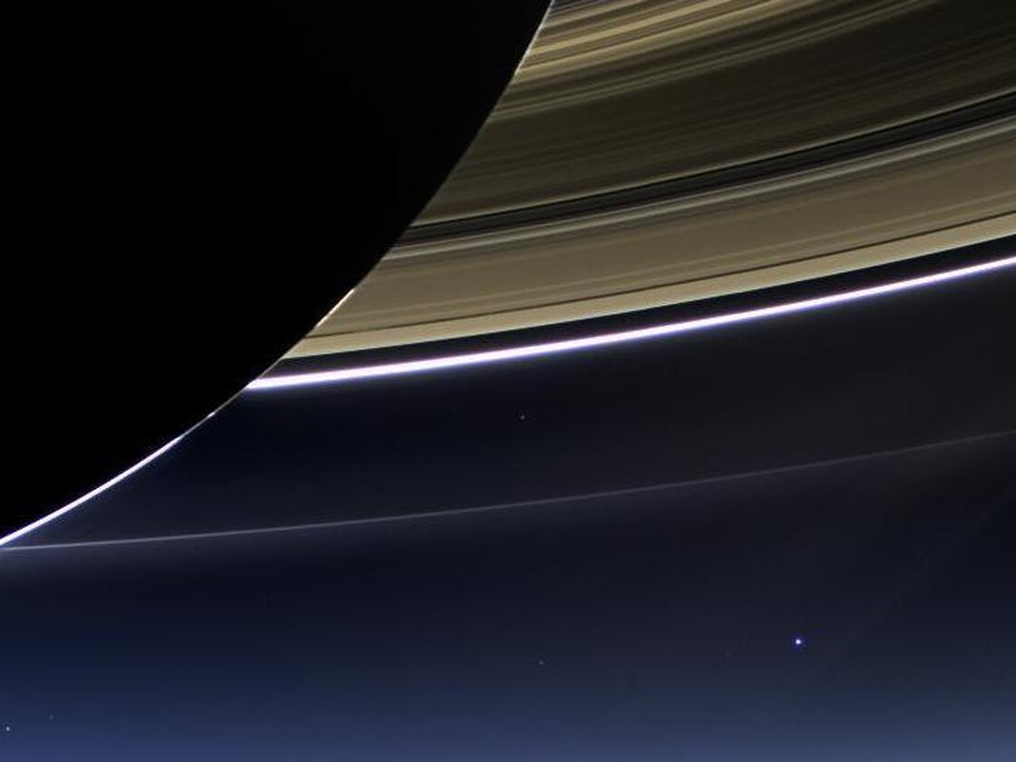 In this rare image taken on July 19, 2013, the wide-angle camera on NASA's Cassini spacecraft has captured Saturn's rings and our planet Earth and its moon in the same frame.