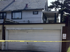 Police tape outside a garage in East Cleveland, Ohio. A woman's body was found inside. Two other victims were also discovered in the neighborhood. Police tape outside a garage in East Cleveland, Ohio. A woman's body was found inside. Two other victims were also discovered in the neighborhood.