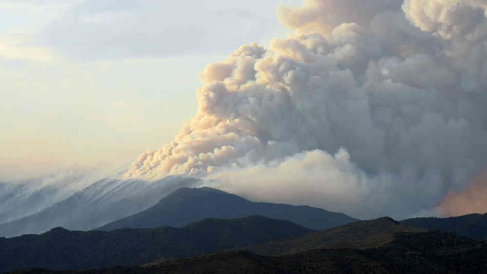 Smoke billows from the Carpenter 1 fire in the Spring Mountains range of Nevada on July 5. As of June 23, more than 27,000 acres have burned. Smoke billows from the Carpenter 1 fire in the Spring Mountains range of Nevada on July 5. As of June 23, more than 27,000 acres have burned.