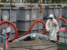 Tokyo Electric Power Co (TEPCO) workers work on waste water tanks at Japan's Fukushima Daiichi nuclear plant in the town of Okuma, Fukushima prefecture in Japan on June 12, 2013. Tokyo Electric Power Co (TEPCO) workers work on waste water tanks at Japan's Fukushima Daiichi nuclear plant in the town of Okuma, Fukushima prefecture in Japan on June 12, 2013.