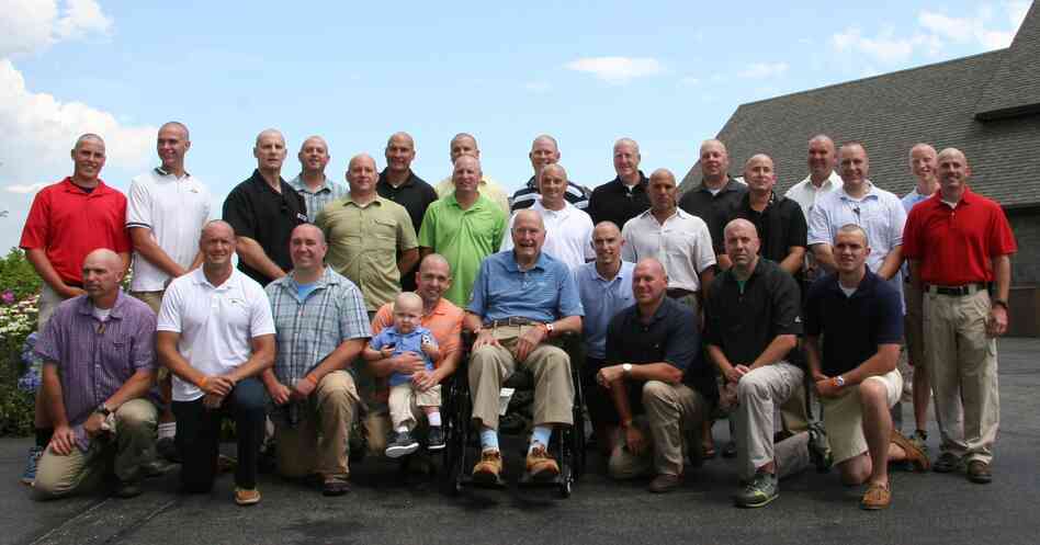 President George H.W. Bush with Patrick and the rest of his Secret Service detail, who also shaved their heads. President George H.W. Bush with Patrick and the rest of his Secret Service detail, who also shaved their heads.