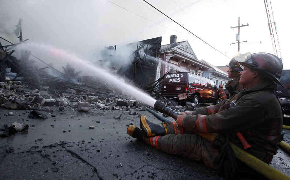 Firefighters work to put out the fire at Hubig's Pies in New Orleans on July 27, 2012. Firefighters work to put out the fire at Hubig's Pies in New Orleans on July 27, 2012.