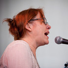 Iris Dement performs at the 2013 Newport Folk Festival. Iris Dement performs at the 2013 Newport Folk Festival.