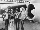 British rockers Led Zeppelin pose in front of their private plane, dubbed "The Starship," in 1973. British rockers Led Zeppelin pose in front of their private plane, dubbed "The Starship," in 1973.