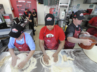 Employees at a Papa John's in New Hyde Park, N.Y., make pizzas in 2012. Restaurant employees have been a focus of debate on Obamacare coverage. Employees at a Papa John's in New Hyde Park, N.Y., make pizzas in 2012. Restaurant employees have been a focus of debate on Obamacare coverage.