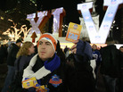 Super Bowl volunteer Ben Schreiber distributes fan guides to any of the thousands of people who may need them while visiting Indianapolis for Super Bowl XLVI festivities, in 2012. Super Bowl volunteer Ben Schreiber distributes fan guides to any of the thousands of people who may need them while visiting Indianapolis for Super Bowl XLVI festivities, in 2012.