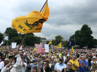 The crowd cheers speaker Glenn Beck (not pictured) during a Tea Party rally to "Audit the IRS" in front of the U.S. Capitol on June 19. The crowd cheers speaker Glenn Beck (not pictured) during a Tea Party rally to "Audit the IRS" in front of the U.S. Capitol on June 19.