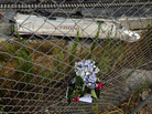 Flowers pay tribute to the victims of the train that crashed in northwestern Spain last week. The driver of the train was on the phone and traveling at nearly twice the speed limit, according to court papers. Flowers pay tribute to the victims of the train that crashed in northwestern Spain last week. The driver of the train was on the phone and traveling at nearly twice the speed limit, according to court papers.