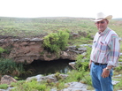 Nate Pike fears that wells, like this one that supplies his ranch with water, will dry up completely after years of water pumping and irrigation in Kansas. Nate Pike fears that wells, like this one that supplies his ranch with water, will dry up completely after years of water pumping and irrigation in Kansas.