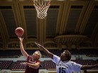 She-Ca-Go's Leona Cochran attempts to block Jo Cahill's shot during the team's game against the Colorado Combos at the National Senior Games in Cleveland on Monday. She-Ca-Go's Leona Cochran attempts to block Jo Cahill's shot during the team's game against the Colorado Combos at the National Senior Games in Cleveland on Monday.