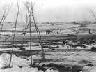 Big Foot's camp three weeks after the Wounded Knee Massacre (Dec. 29, 1890), with bodies of several Lakota Sioux people wrapped in blankets in the foreground and U.S. soldiers in the background. Big Foot's camp three weeks after the Wounded Knee Massacre (Dec. 29, 1890), with bodies of several Lakota Sioux people wrapped in blankets in the foreground and U.S. soldiers in the background.